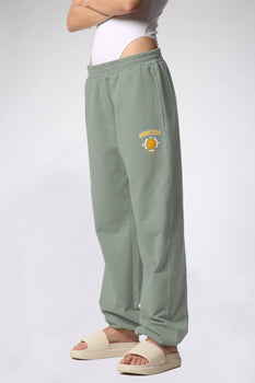 Bonkers Corner Jade Joggers in XS, featuring a relaxed fit, soft fabric, and stylish green color.