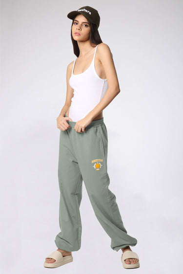 Bonkers Corner Jade Joggers in XS, soft green fabric, featuring a relaxed fit and elastic waistband for comfortable wear.