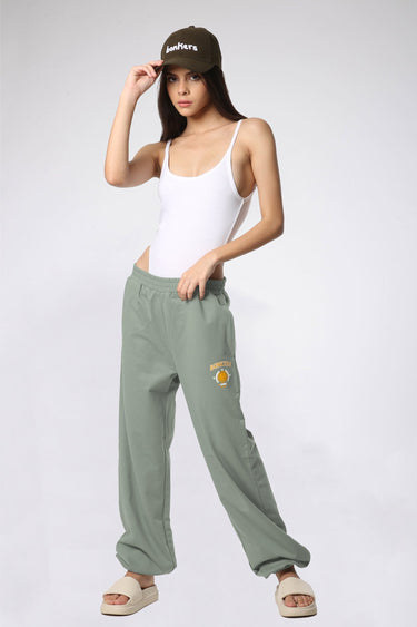 Bonkers Corner Jade Joggers in XS, showing soft green fabric and relaxed fit, perfect for casual wear.