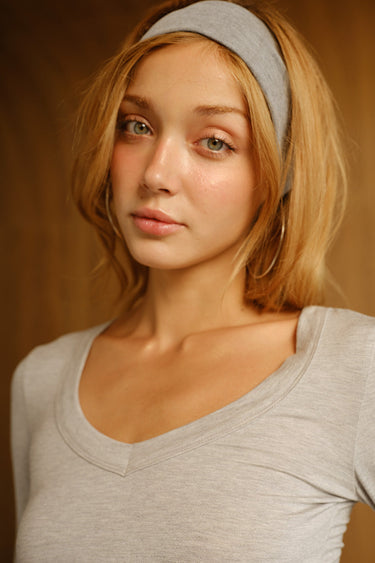 Light grey modal long sleeve top by Bonkers Corner, shown on model with a relaxed fit and soft fabric.