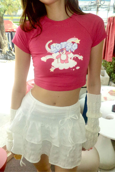 Bonkers Corner Lotso Baby Tee in XS, featuring a soft pink fabric and playful Lotso character graphic on the front.