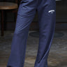 Marine blue wide-leg sweatpants by Bonkers Corner, with relaxed fit and comfortable fabric, shown hanging on a plain background.