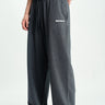 Bonkers Corner Midnight Miles loose fit joggers in dark fabric, relaxed style with elastic waistband and tapered legs.