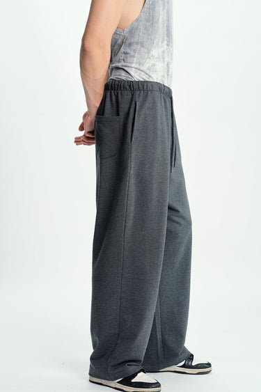 Bonkers Corner Midnight Miles loose fit joggers in dark fabric, featuring an elastic waistband and relaxed style for comfortable wear.