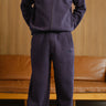 Navy blue Bonkers Corner On The Go joggers with elastic waistband and relaxed fit, shown on a model.