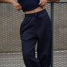 Navy blue Bonkers Corner On The Go Joggers, casual jogger pants with elastic waistband and relaxed fit, shown in the image.