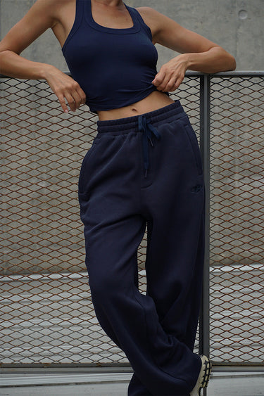 Navy blue Bonkers Corner On The Go Joggers, casual jogger pants with elastic waistband and relaxed fit, shown in the image.