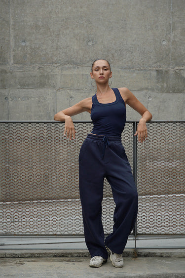 Navy blue Bonkers Corner On The Go joggers with elastic waistband and relaxed fit, perfect for casual wear.