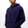 Navy blue Wear A Hug oversized hoodie by Bonkers Corner, featuring a relaxed fit and soft fabric for comfort.