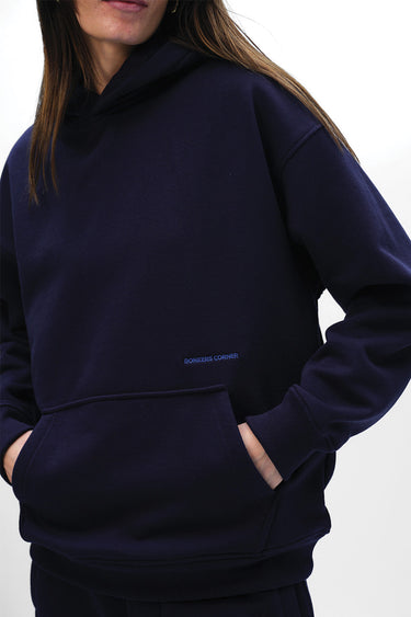 Navy blue Wear A Hug oversized hoodie by Bonkers Corner, featuring a relaxed fit and soft fabric for comfort.