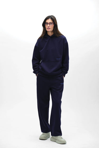 Navy blue Wear A Hug oversized hoodie by Bonkers Corner, featuring a relaxed fit and soft fabric for cozy comfort.