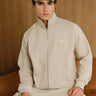 Bonkers Corner Oatmilk High Neck Zipper Jacket shown in XS with a high collar and front zipper detail.