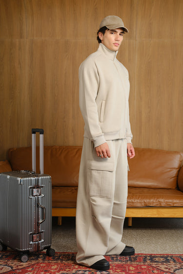 Bonkers Corner oatmilk high neck zipper jacket in XS with a sleek design and front zipper detail.