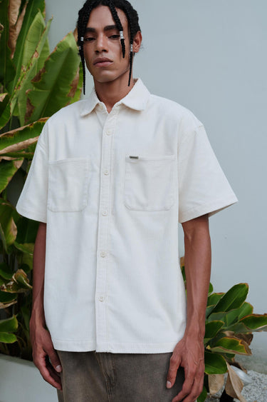 Bonkers Corner Off White Corduroy Shirt shown with long sleeves and classic collar, made from soft textured corduroy fabric.