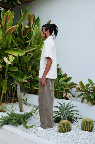 Bonkers Corner off-white corduroy shirt featuring a classic button-up design and textured fabric.