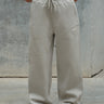 Bonkers Corner Off White On The Go Joggers in XS, featuring a relaxed fit and drawstring waistband for comfortable casual wear.