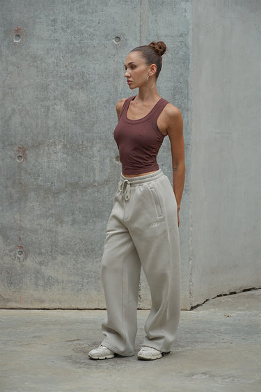 Off White On The Go Joggers by Bonkers Corner, lightweight gray athletic pants with drawstring waist and tapered fit.
