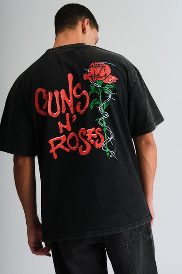 Official Guns N' Roses faded oversized T-shirt by Bonkers Corner, featuring band logo and distressed design.