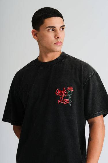 Bonkers Corner Official Guns N Roses faded oversized T-shirt featuring band logo and vintage style design.