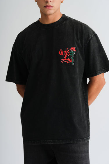 Bonkers Corner official Guns N' Roses faded oversized T-shirt featuring band logo and vintage style, made from soft fabric.