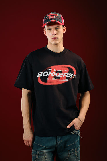 Black oversized T-shirt by Bonkers Corner with a relaxed fit and bold graphic design, perfect for casual streetwear.