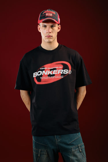 Black oversized T-shirt from Project: Bonkers by Bonkers Corner, featuring a relaxed fit and casual style.