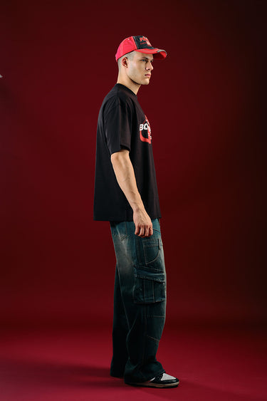 Black oversized T-shirt from Bonkers Corner featuring bold "Project: Bonkers" print, casual fit, and soft cotton fabric.