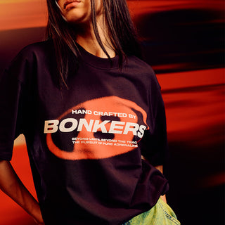 Black oversized T-shirt from Bonkers Corner featuring a relaxed fit and casual style, displayed on a plain background.