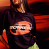 Black oversized T-shirt from Bonkers Corner featuring a relaxed fit and casual style, displayed on a plain background.