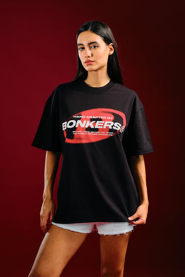 Black oversized T-shirt by Bonkers Corner featuring a relaxed fit and casual style, displayed on a plain background.