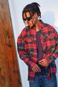 Red and blue checkered oversized shirt by Bonkers Corner, front view showing classic pattern and relaxed fit.