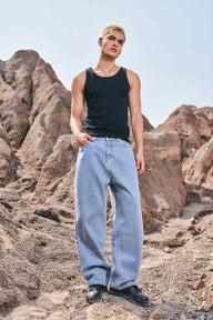 Regular blue wide-leg straight jeans by Bonkers Corner, shown on a model with a relaxed fit and classic denim style.