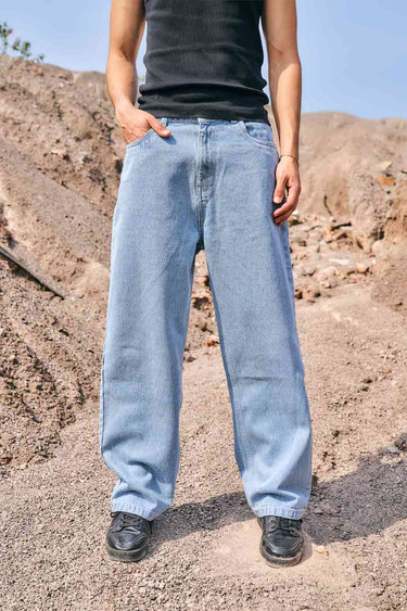 Bonkers Corner regular blue wide-leg straight jeans displayed on a model, showcasing a casual and comfortable fit.