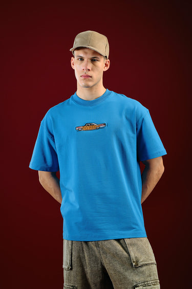 Bonkers Corner Ride In Style oversized T-shirt in white, featuring bold graphic design and relaxed fit for casual wear.