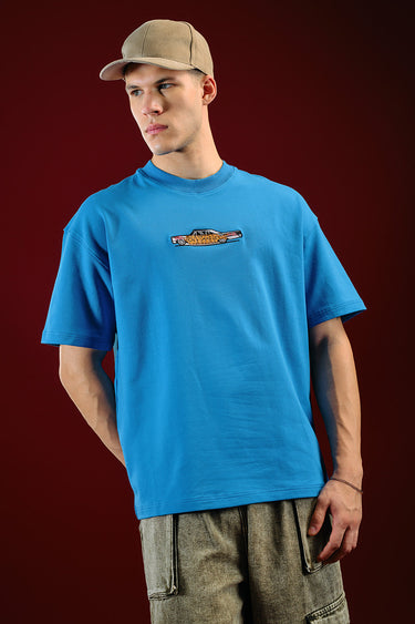 Bonkers Corner Ride In Style oversized T-shirt in white, featuring bold graphic print and relaxed fit for casual comfort.