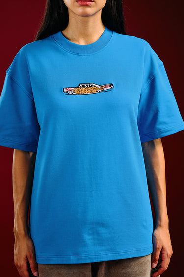 Bonkers Corner Ride In Style oversized T-shirt in white with bold graphic print, casual fit, and short sleeves.