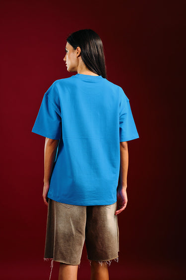 Bonkers Corner Ride In Style oversized T-shirt in white, featuring bold graphic design, casual fit, and comfortable fabric.