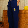 Royal blue Bonkers Corner straight fit sweatpants laid flat on white background, showing the comfortable design and elastic waistband.
