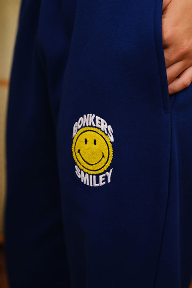 Royal blue straight fit sweatpants by Bonkers Corner, shown with elastic waistband and relaxed fit for casual comfort.