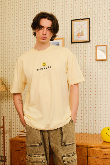 Bonkers Corner Seeking The Positive oversized T-shirt in XS with positive message and casual fit, displayed on a model.