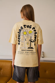 Oversized Seeking The Positive T-shirt by Bonkers Corner, featuring a relaxed fit and positive message in bold lettering.