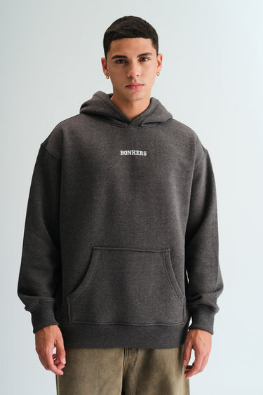 Bonkers Corner Signature Dark Grey Melange Hoodie shown on a hanger, featuring a soft fabric and casual fit.