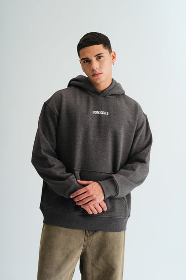 Bonkers Corner dark grey melange hoodie with signature logo, displayed on a hanger, showcasing casual streetwear style.