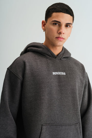 Bonkers Corner Signature Dark Grey Melange Hoodie shown on a model, featuring a comfortable fit and casual style.