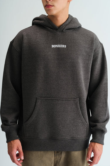 Bonkers Corner Signature Dark Grey Melange Hoodie displayed flat, showing the soft fabric and relaxed fit.
