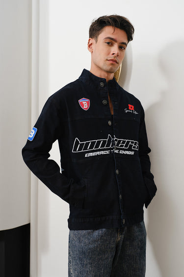 Bonkers Corner Signature Denim Jacket in XS, shown on a hanger with classic blue wash and button-front design.