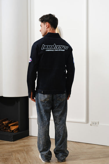 Bonkers Corner Signature Denim Jacket shown on a model, featuring classic blue denim, button-up front, and stylish collar details.