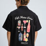 Bonkers Corner Signature Happy Hour oversized shirt in XS, featuring a relaxed fit and casual design with a graphic print.