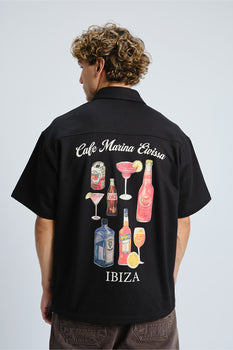 Bonkers Corner Signature Happy Hour oversized shirt in XS, featuring a relaxed fit and casual design with a graphic print.