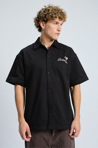 Bonkers Corner Signature Happy Hour oversized shirt in XS, featuring casual fit and stylish design, shown on a hanger.